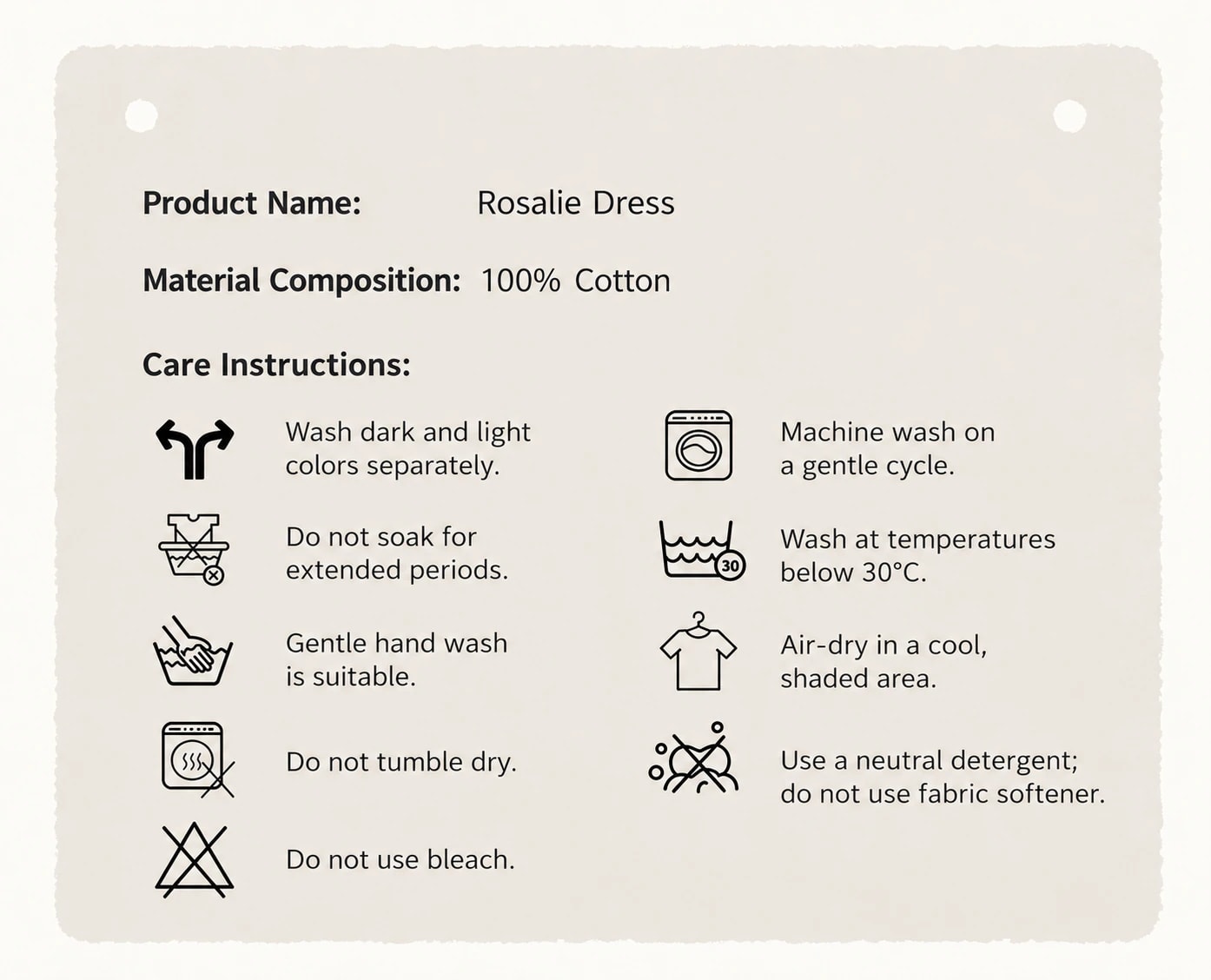 Fabric and care card for the Rosalie Dress: 100% cotton, with washing instructions.